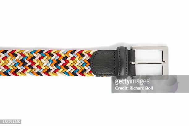 the end of a colourful belt on a white background - ceinture par dessus photos et images de collection