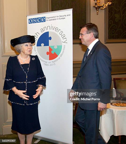 Queen Beatrix of The Netherlands and Ukrainian Foreign Minister Leonid Kozhara attend the National Minorities conference on March 7, 2013 in The...