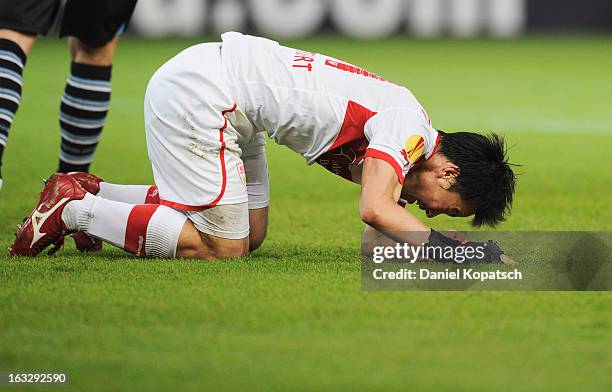 Shinji Okazaki of Stuttgart reacts during the UEFA Europa League round of sixteen first leg match between VfB Stuttgart and Lazio at Mercedes-Benz...