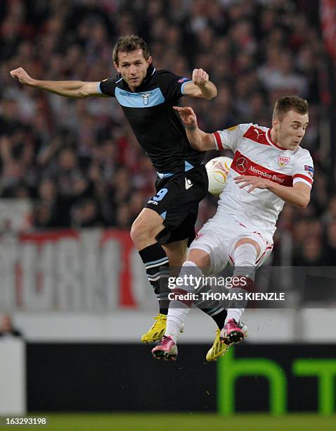 Stuttgart's Romanian midfielder Alexandru Maxim and Lazio's Bosnian defender Senad Lulic vie for the ball during the UEFA Europa League Round of 16...