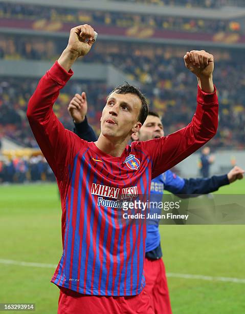 Vlad Chiriches of FC Steaua celebrates their win after the UEFA Europa League Round of 16 match between FC Steaua Bucuresti and Chelsea at the...