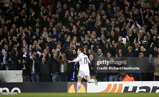 Gareth Bale of Tottenham Hotspur celebrates scoring his side's first goal during the UEFA Europa League Round of 16 First Leg match between Tottenham...