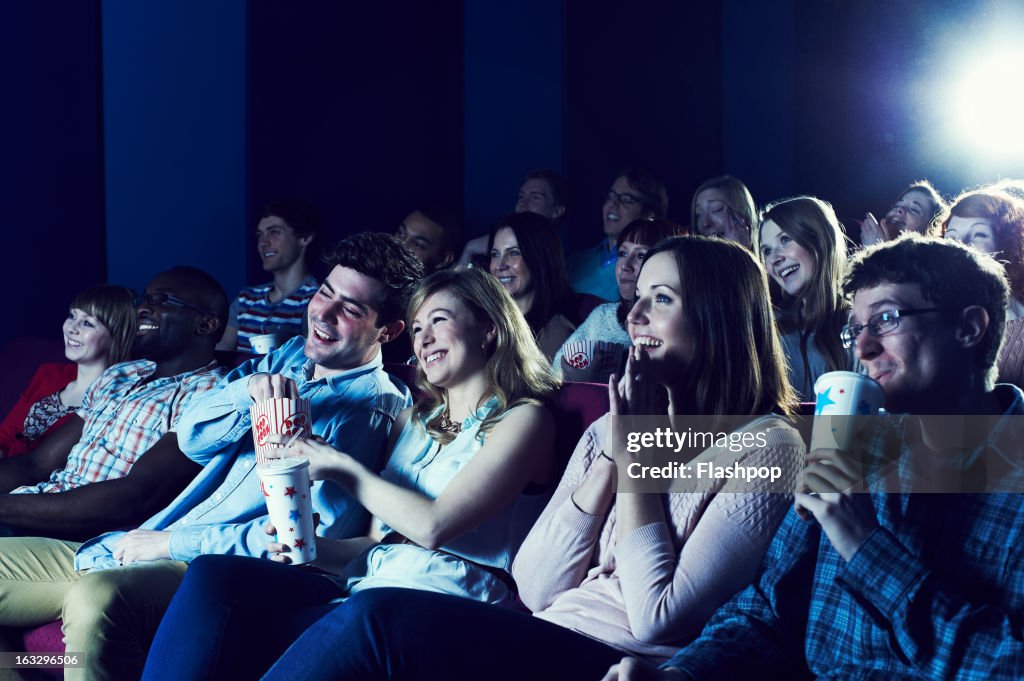 Audience enjoying movie at the cinema