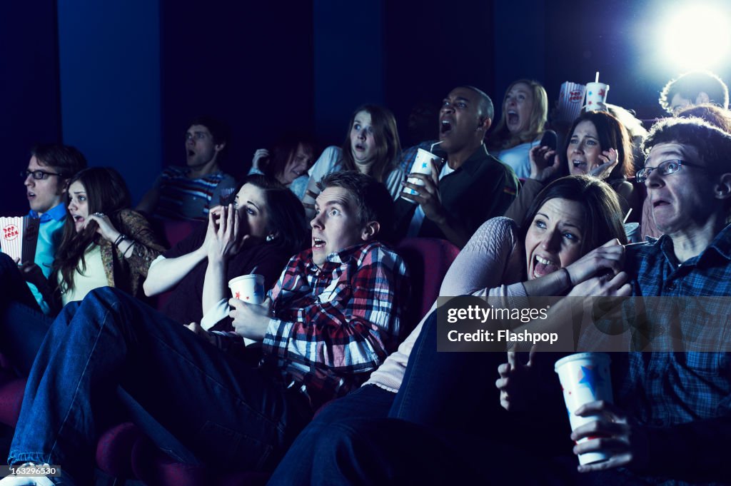 Audience enjoying movie at the cinema