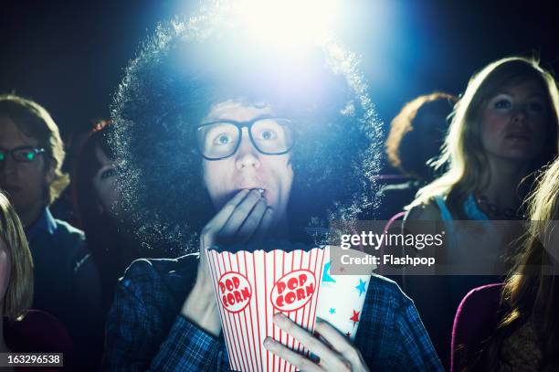 man enjoying movie at cinema - her film 2013 stock pictures, royalty-free photos & images