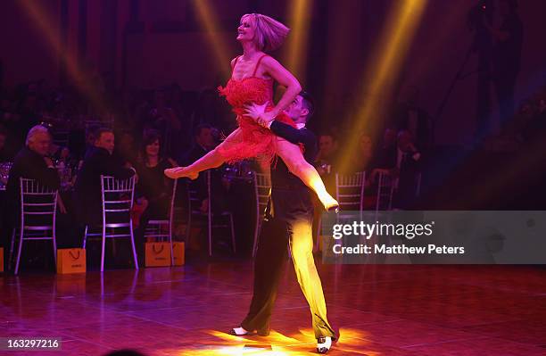 Presenter Jacquie Beltrao performs a ballroom dancing routine as part of Dancing with United, in aid of the Manchester United Foundation, at Old...