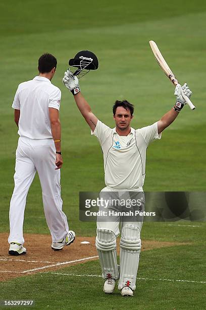 Hamish Rutherford of New Zealand celebrates scoring a century during day three of the First Test match between New Zealand and England at University...