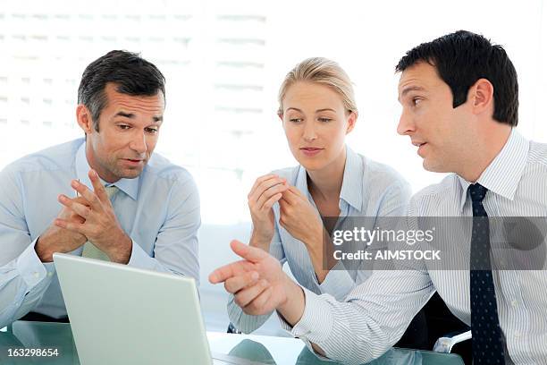 managers working together - cfo stock pictures, royalty-free photos & images