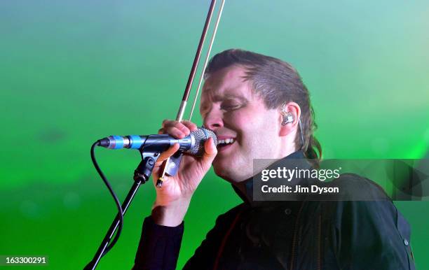 Singer Jonsi Birgisson of Icelandic group Sigur Ros performs live on stage at Brixton Academy on March 7, 2013 in London, England.