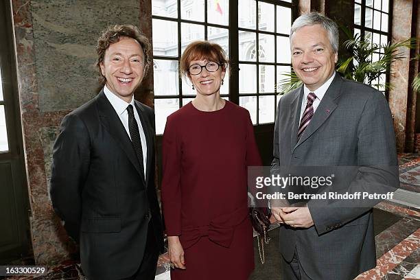 French journalist and author Stephane Bern , Belgian Forein Minister and Vice Prime Minister Didier Reynders and Reynders' wife Bernadett pose prior...