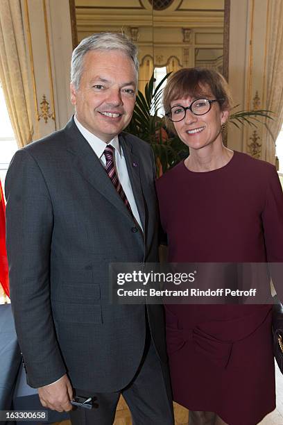 Belgian Forein Minister and Vice Prime Minister Didier Reynders and his wife Bernadette pose prior French journalist and author Stephane Bern to be...