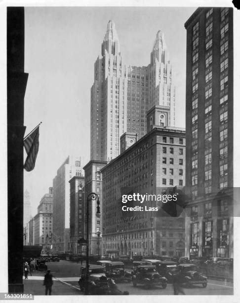 The Waldorf Astoria Towers in the distance over the other buildings on Park Avenue in New York City, 1930s.