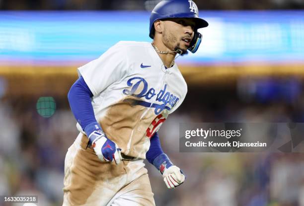 Mookie Betts of the Los Angeles Dodgers runs the bases after hitting a solo run home run against the Arizona Diamondbacks during the sixth inning at...