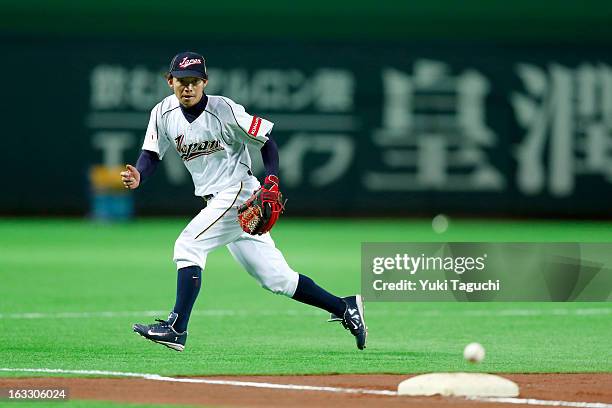 Takashi Toritani of Team Japan fields ground balls during the World Baseball Classic workout day at the Yahoo Dome on February 27, 2013 in Fukuoka,...