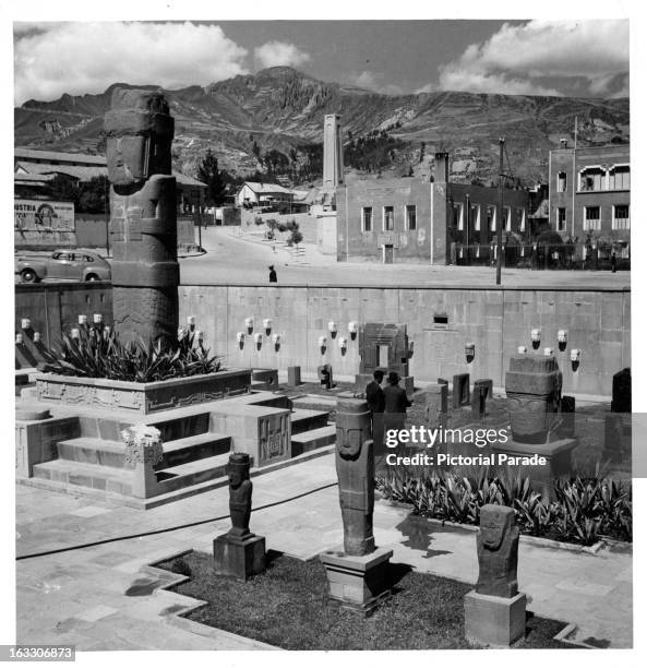 Partial view of The Tiahuanaco Museum, in the background you can see the mountains with the clouds hovering over them in La Paz, Bolivia, 1955.