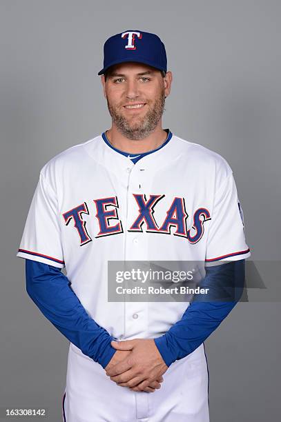 Lance Berkman of the Texas Rangers poses during Photo Day on February 20, 2013 at Surprise Stadium in Surprise, Arizona.