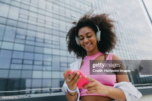 portrait of young stylish generation z girl taking selfie on smartphone. - z com stock pictures, royalty-free photos & images