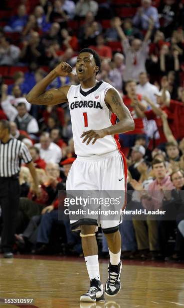 Georgia's Kentavious Caldwell-Pope pumps up the crowd up after hitting a 3-pointer against Kentucky in the second half at Stegeman Coliseum in...