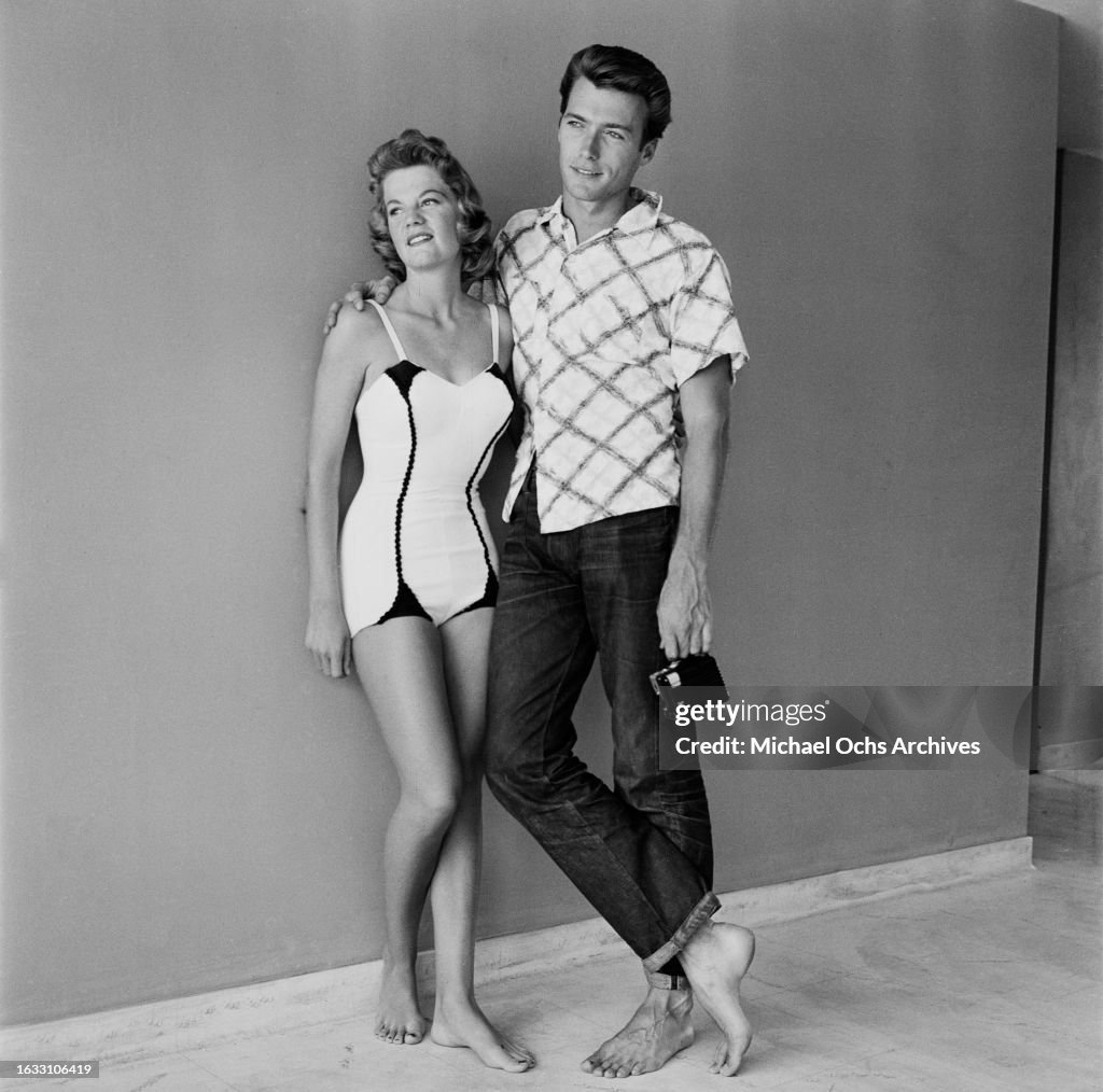 Maggie Johnson, wearing a swimsuit, beside her husband, American