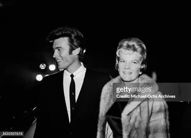 American actor and film director Clint Eastwood and his wife, Maggie Johnson, attend the West Coast premiere of 'Breakfast at Tiffany's,' held at...