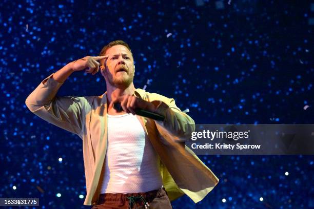 Dan Reynolds of Imagine Dragons performs onstage at Paris La Defense Arena on August 22, 2023 in Nanterre, France.