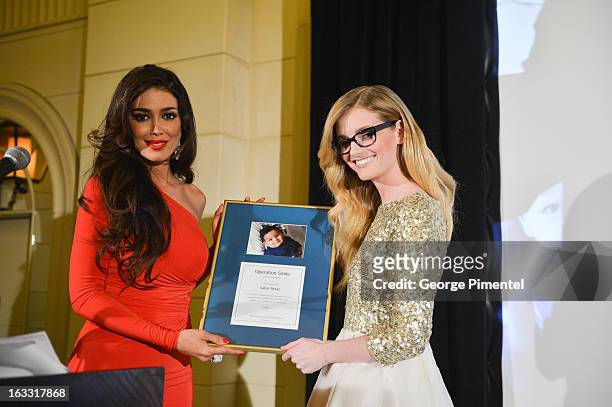 Sahar Biniaz, Miss Universe Canada 2012 and Lydia Hearst attend Operation Smile's Toronto Smile Event at Windsor Arms Hotel on March 7, 2013 in...
