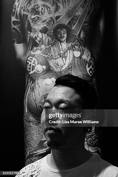 Tattoo artist Sheng poses during The Australian Tattoo & Body Art Expo at the Royal Hall of Industries, Moore Park on March 8, 2013 in Sydney,...