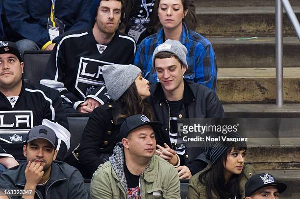 Shenae Grimes and Josh Beech attend a hockey game between the Dallas Stars and Los Angeles Kings at Staples Center on March 7, 2013 in Los Angeles,...