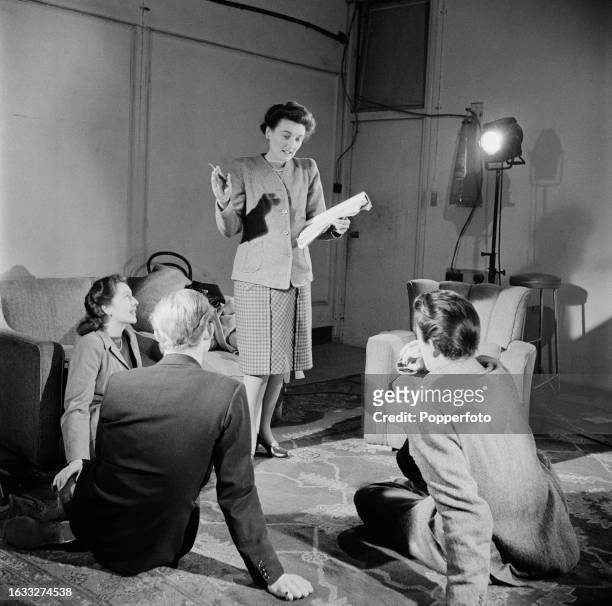 Students from the film training scheme for actors entitled The Company of Youth, including Northern Irish actor Maxwell Reed seated on right, are...