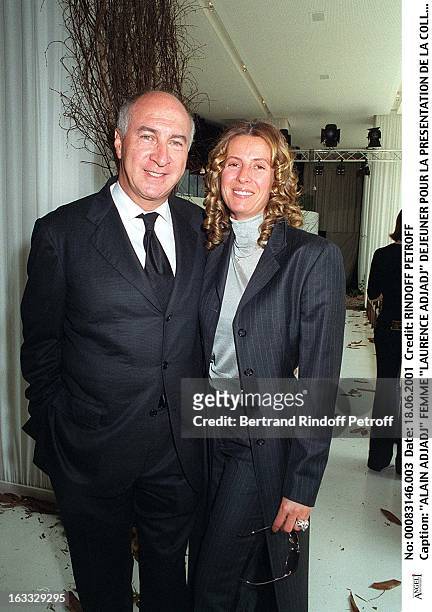 Alain Adjadj and wife Laurence Adjadj at theDolce Et Gabanna Collection Presentation Lunch At La Maison Blanche In Paris.