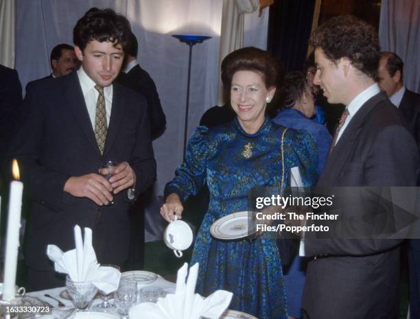 Princess Margaret with her son Viscount Linley and his business partner Matthew Rice at a Mappin and Webb reception in London, circa May 1988.