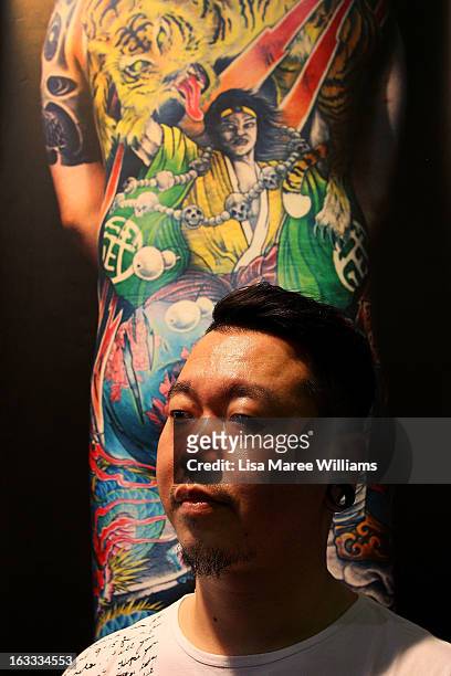 Tattoo artist Sheng poses during The Australian Tattoo & Body Art Expo at the Royal Hall of Industries, Moore Park on March 8, 2013 in Sydney,...
