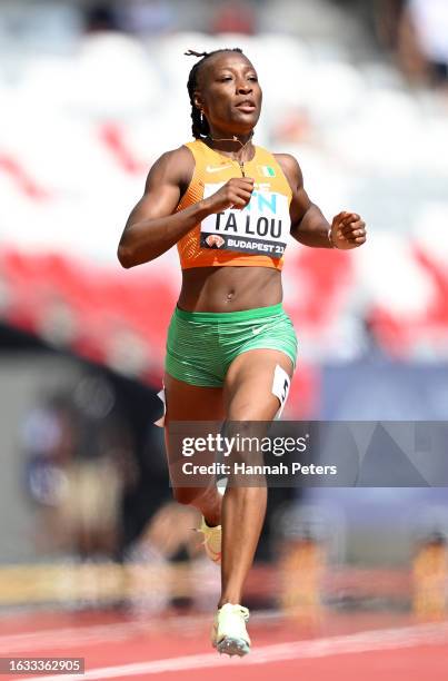 Marie-Josee Ta Lou of Team Ivory Coast competes in the Women's 200m Heats during day five of the World Athletics Championships Budapest 2023 at...