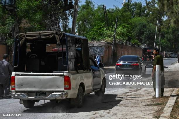 Convoy of vehicles carrying a special court judge Abual Hasnat Muhammad Zulqarnain, leaves from the Attock prison after the case hearing of former...