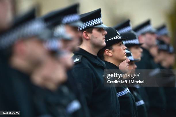 Police recruits participate in a passing out parade at Tulliallan Police College on March 8, 2013 in Tulliallan, Scotland. All eight Police Forces in...