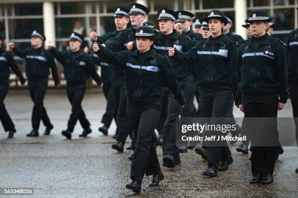 Police recruits participate in a passing out parade at Tulliallan Police College on March 8, 2013 in Tulliallan, Scotland. All eight Police Forces in...