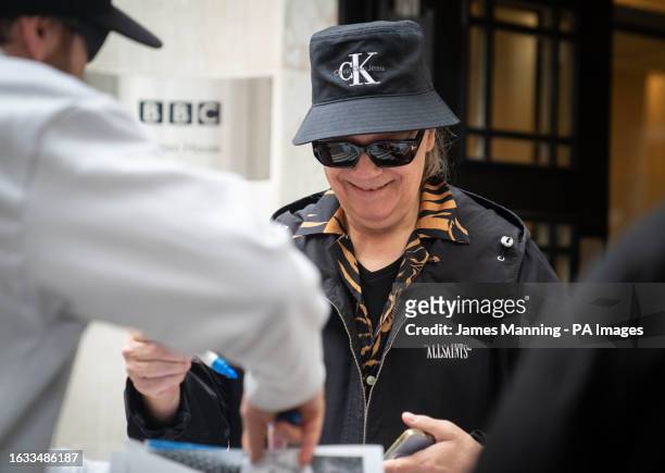 Duran Duran's Andy Taylor greets fans as he leaves Wogan House in central London to appear on the Zoe Ball Breakfast Show on Radio 2. The 62-year-old...