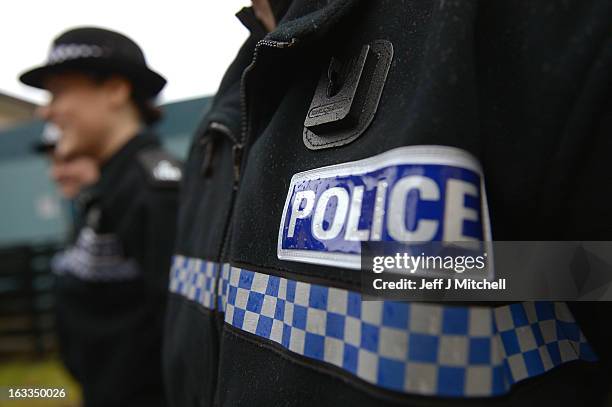 Police recruits participate in a passing out parade at Tulliallan Police College on March 8, 2013 in Tulliallan, Scotland. All eight Police Forces in...