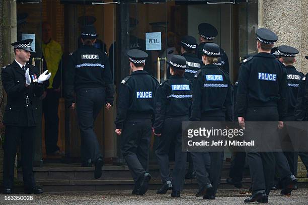 Police recruits participate in a passing out parade at Tulliallan Police College on March 8, 2013 in Tulliallan, Scotland. All eight Police Forces in...