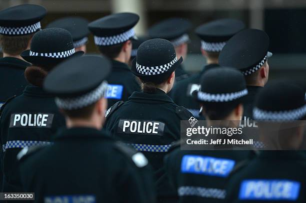 Police recruits participate in a passing out parade at Tulliallan Police College on March 8, 2013 in Tulliallan, Scotland. All eight Police Forces in...