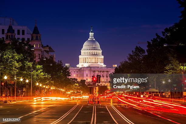 capitol building from pennsylvania avenue - capitol building washington dc stock pictures, royalty-free photos & images