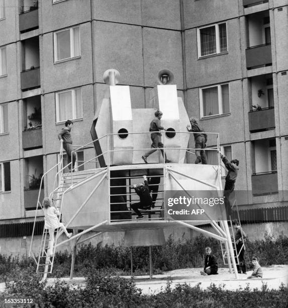 Picture taken on August 31 1973 in Szekesfehervar, western Hungary, shows children playing on the playground of the "Kun Bela" housing estate. The...