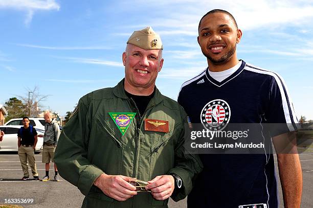 Eric Gordon of the New Orleans Hornets meets with local military personnel thanking them for their service on March 7, 2013 at the Joint Reserve Base...