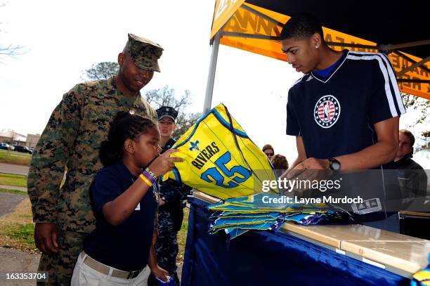Anthony Davis of the New Orleans Hornets meets with local military personnel thanking them for their service on March 7, 2013 at the Joint Reserve...