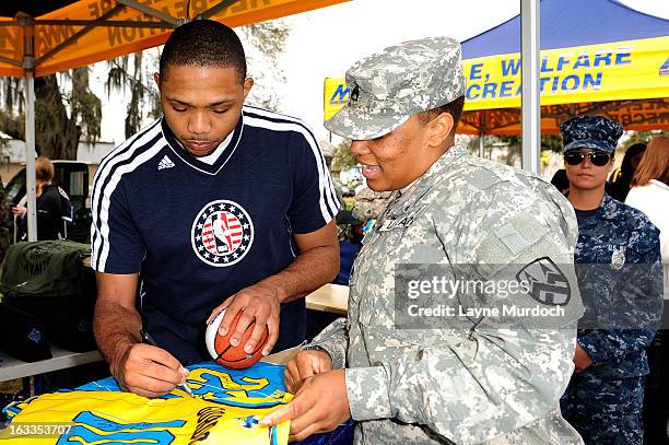 Eric Gordon of the New Orleans Hornets meets with local military personnel thanking them for their service on March 7, 2013 at the Joint Reserve Base...