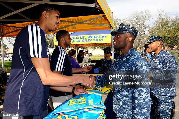 Eric Gordon and Anthony Davis of the New Orleans Hornets meet with local military personnel thanking them for their service on March 7, 2013 at the...
