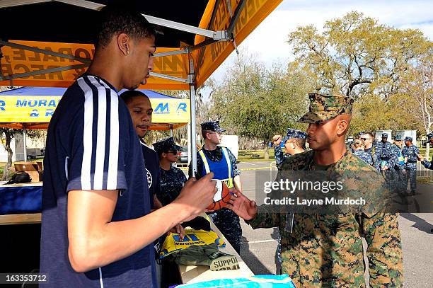 Eric Gordon and Anthony Davis of the New Orleans Hornets meet with local military personnel thanking them for their service on March 7, 2013 at the...