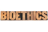 bioethics word in wood type