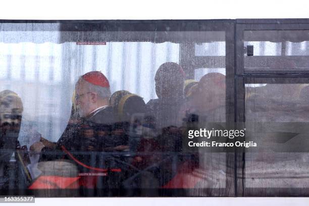 Archbischop of Boston cardinal Sean O'Malley and cardinals from USA leave the Paul VI Hall in a minibus at the end of the seventh general...