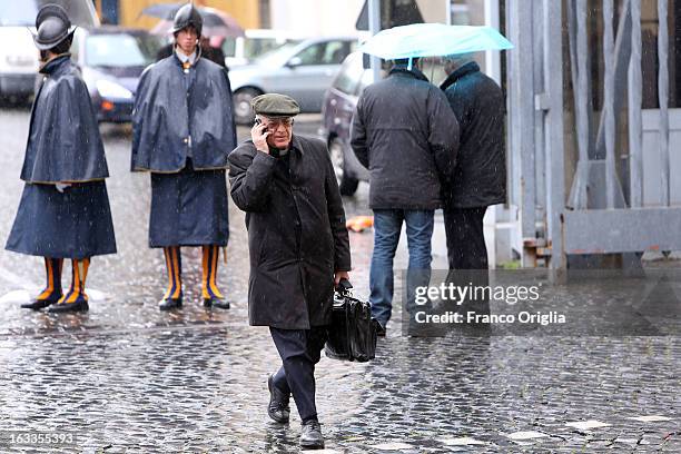 Vatican spokesman father Federico Lombardi leaves the Paul VI Hall at the end of the seventh general congregation on March 8, 2013 in Vatican City,...